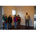 Residents taking a tour inside of the Brawley Street duplex
