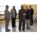 A group of men congratulating Mr. Byrd on his retirement