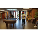 Residents enjoy a game of pool