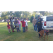 K-9 Officer doing maneuvers with his police dog for an audience of children