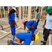 Three YouthBuilders framing an inside wall